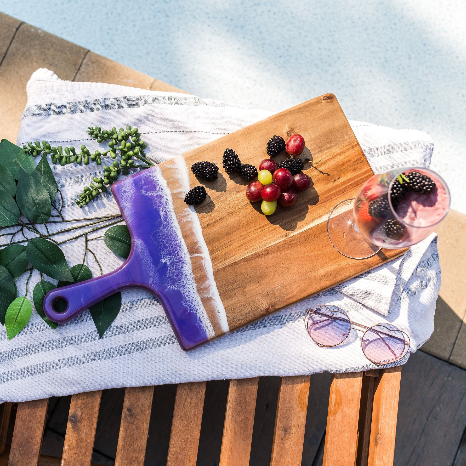 grape themed board accented with resin