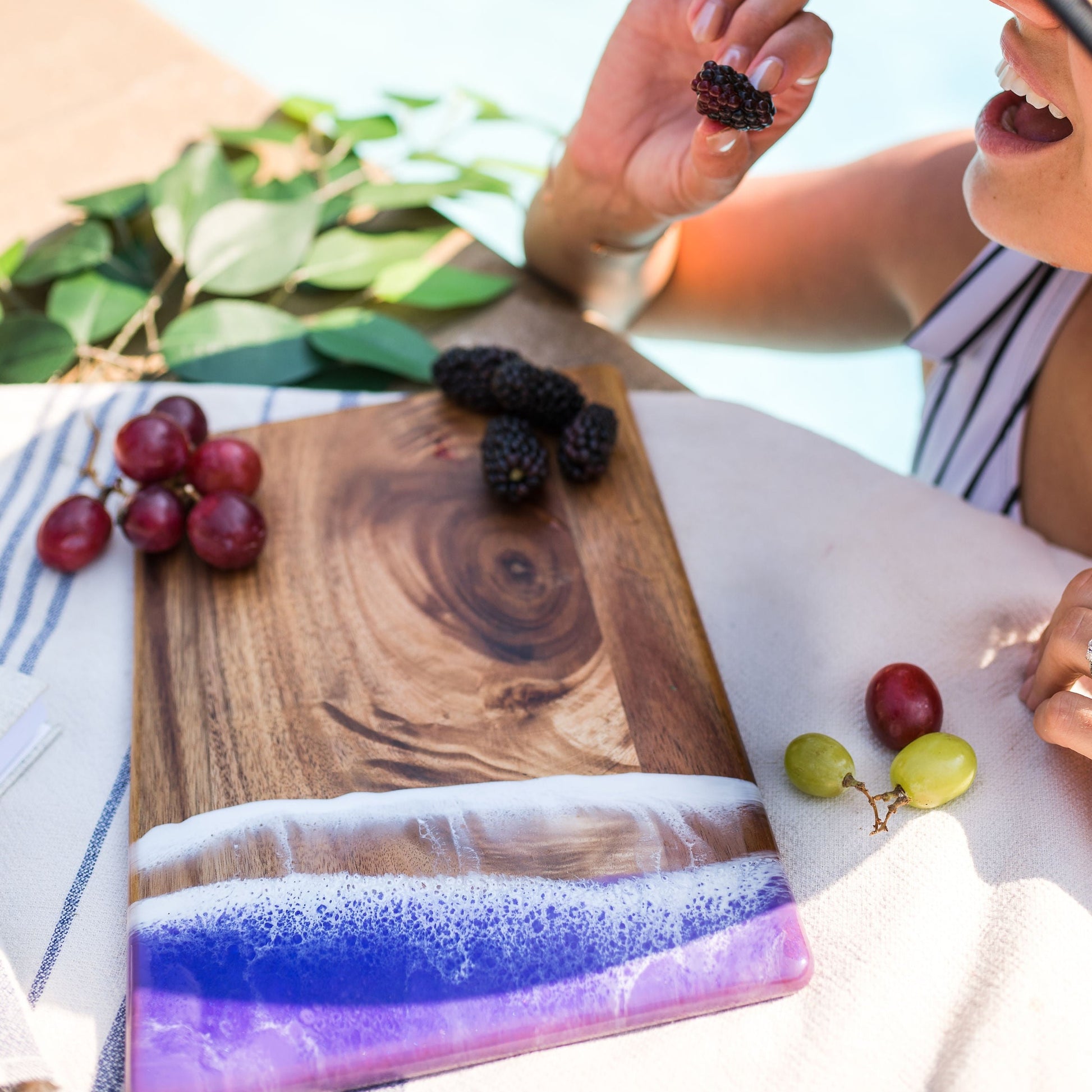 grape themed board accented with resin