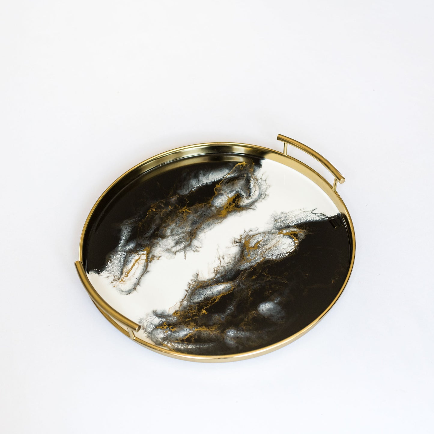 gold round metal tray accented with resin