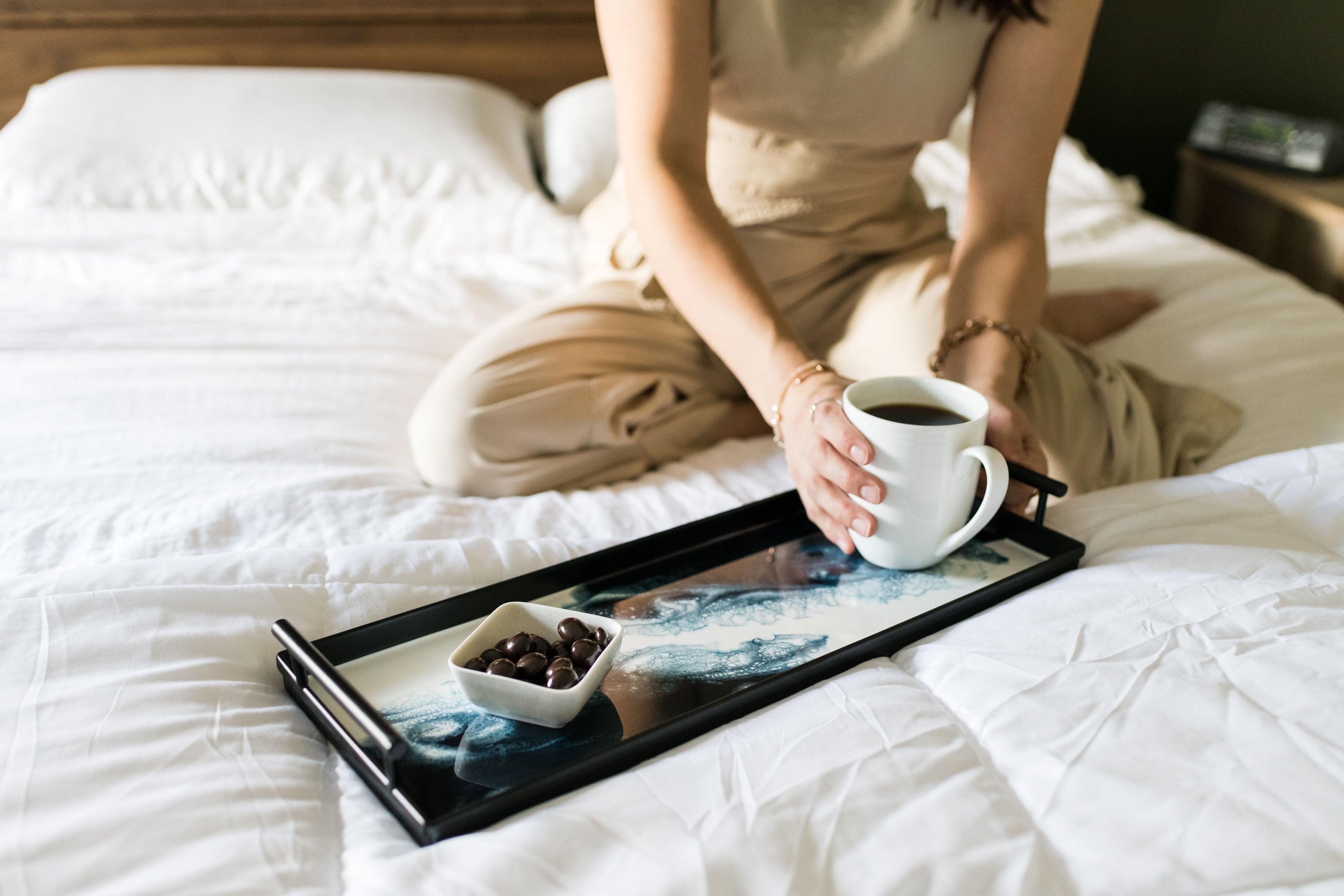 Navy metal tray on bed