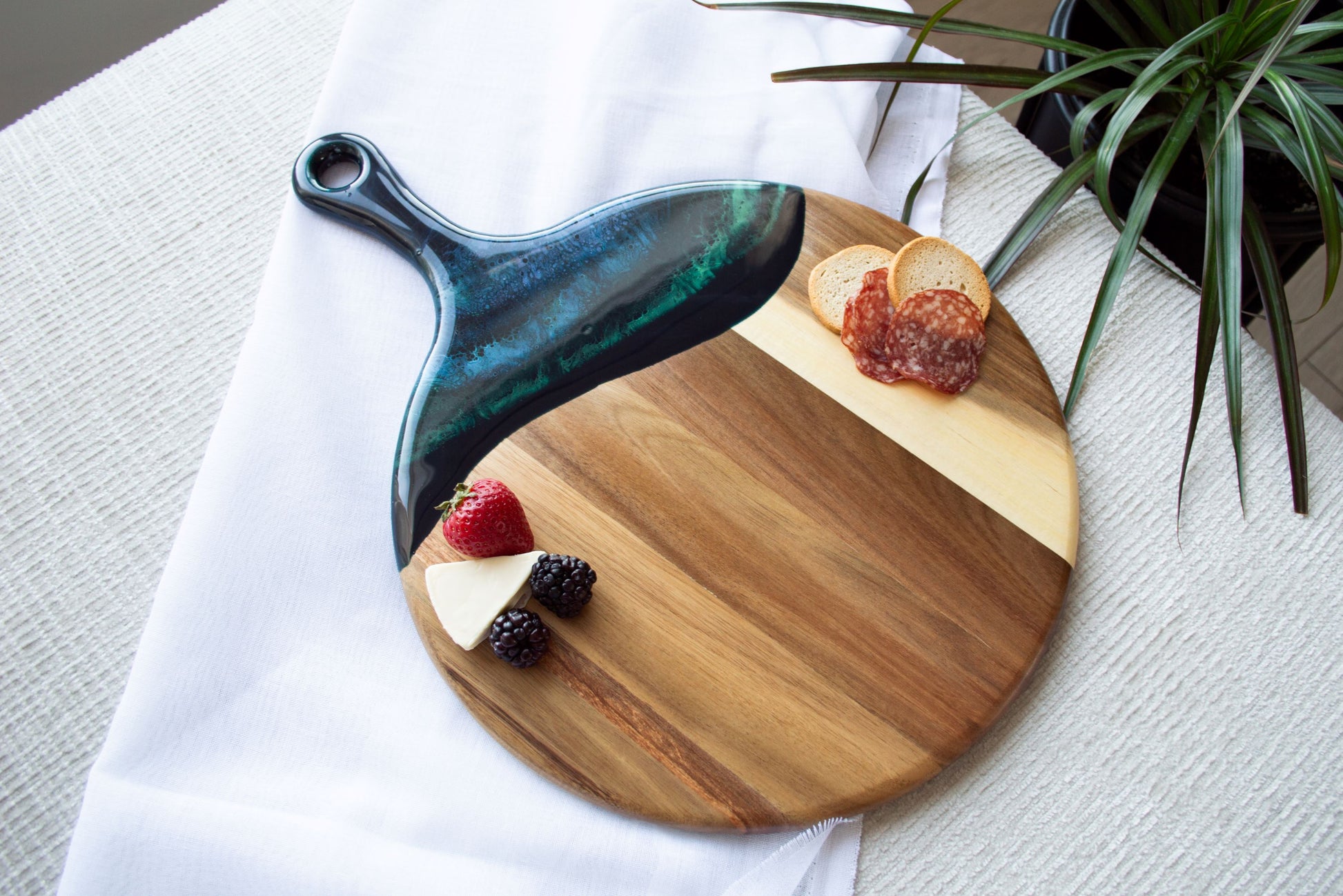 Northern lights round paddle cheese board