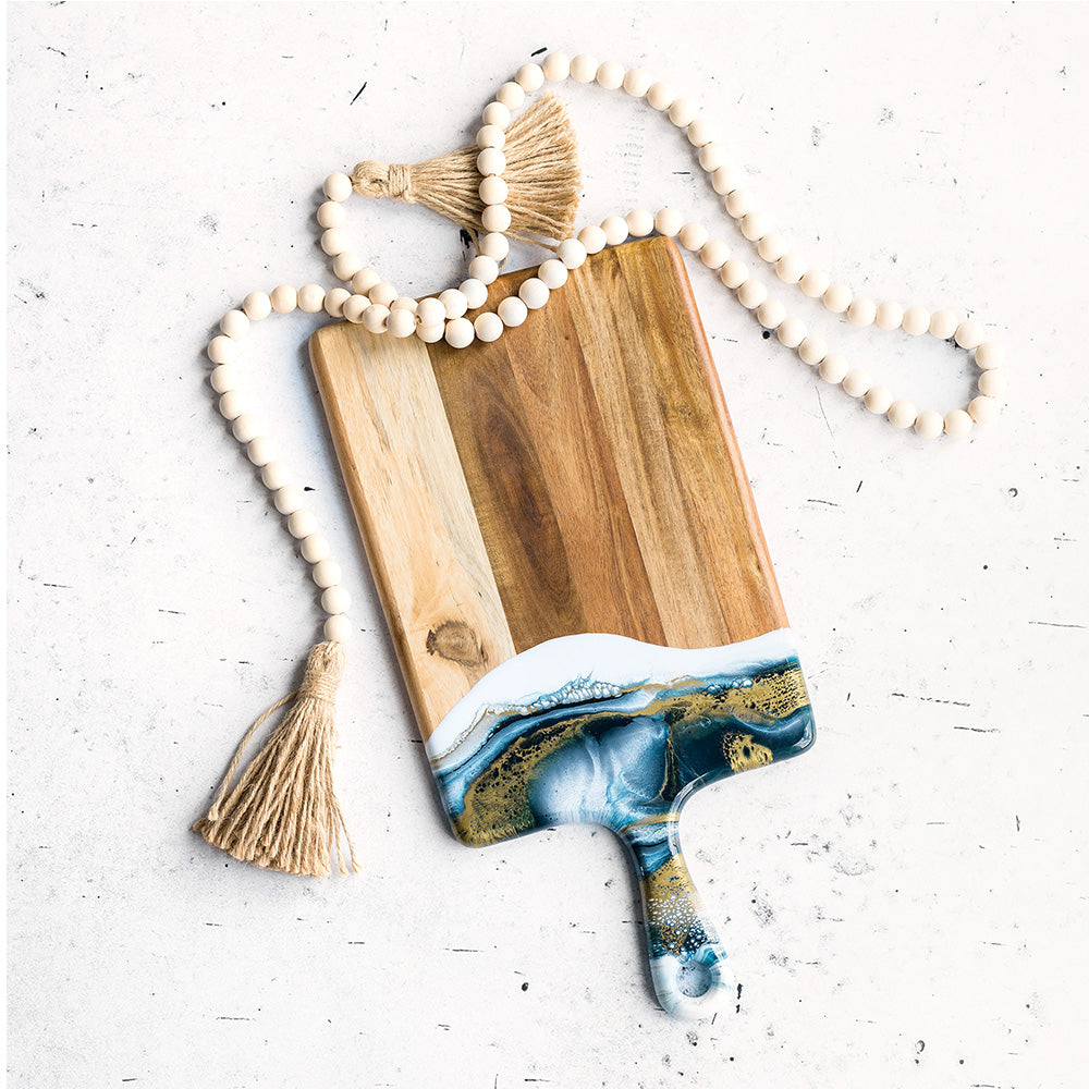 medium acacia cheese board accented with resin