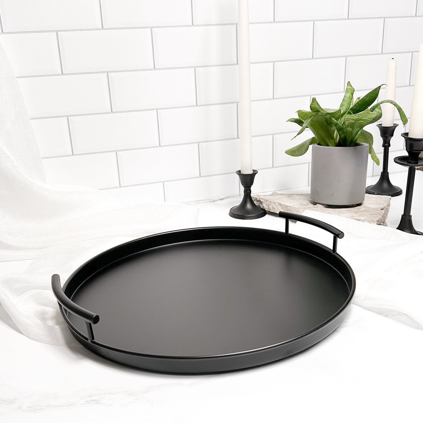 black round metal tray