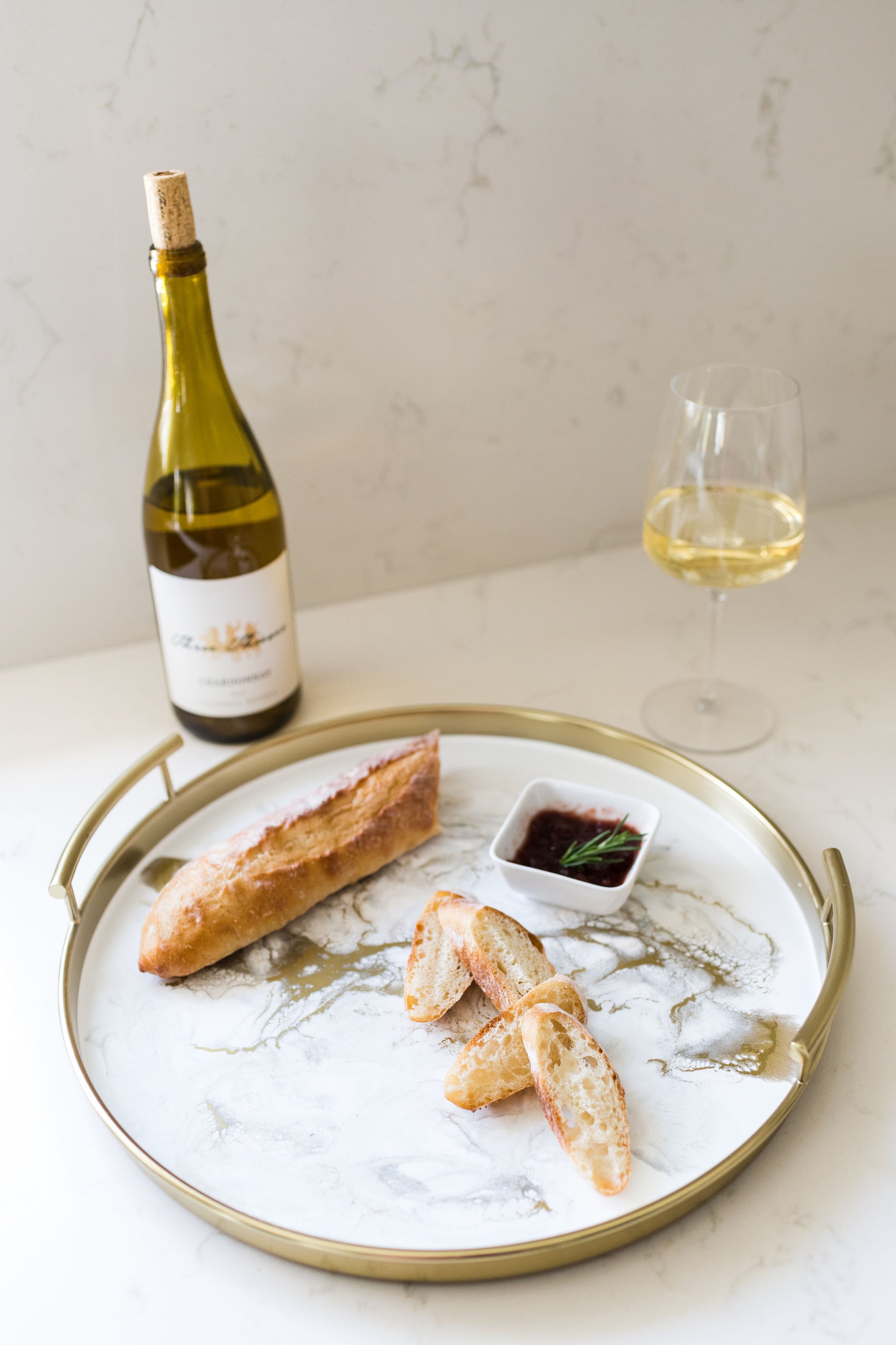 gold round metal tray accented with resin