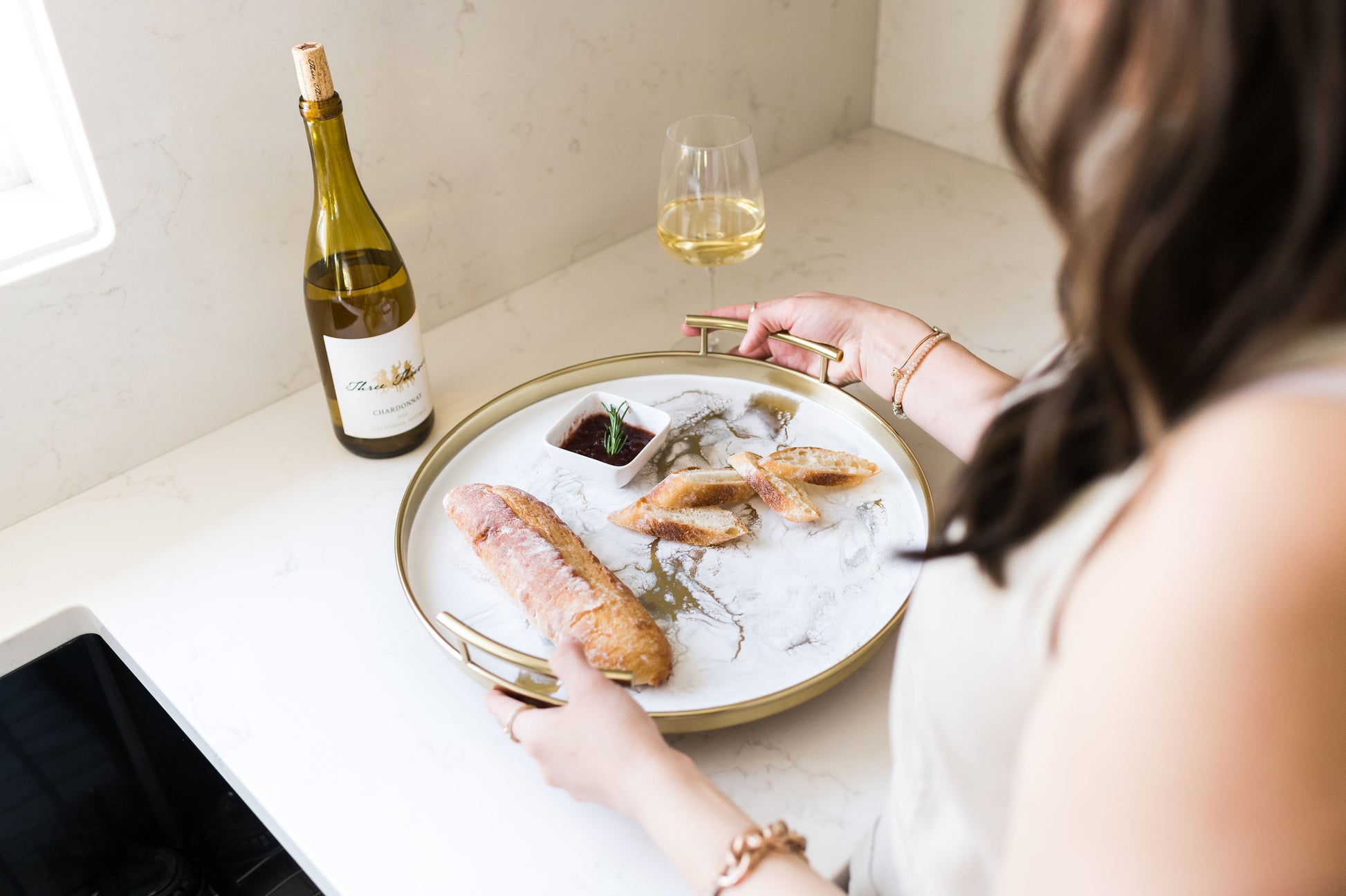 gold round metal tray accented with resin