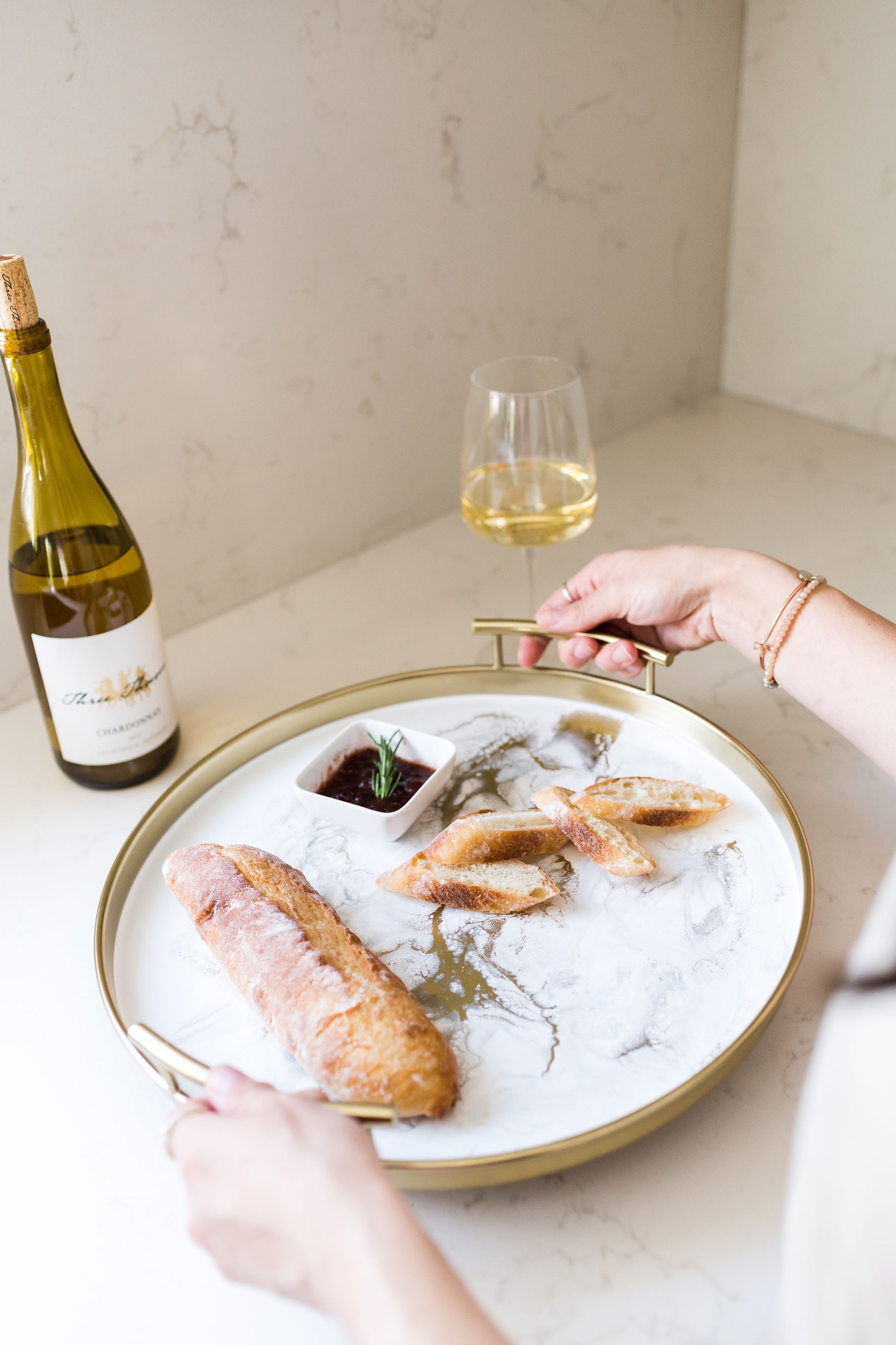gold round metal tray accented with resin
