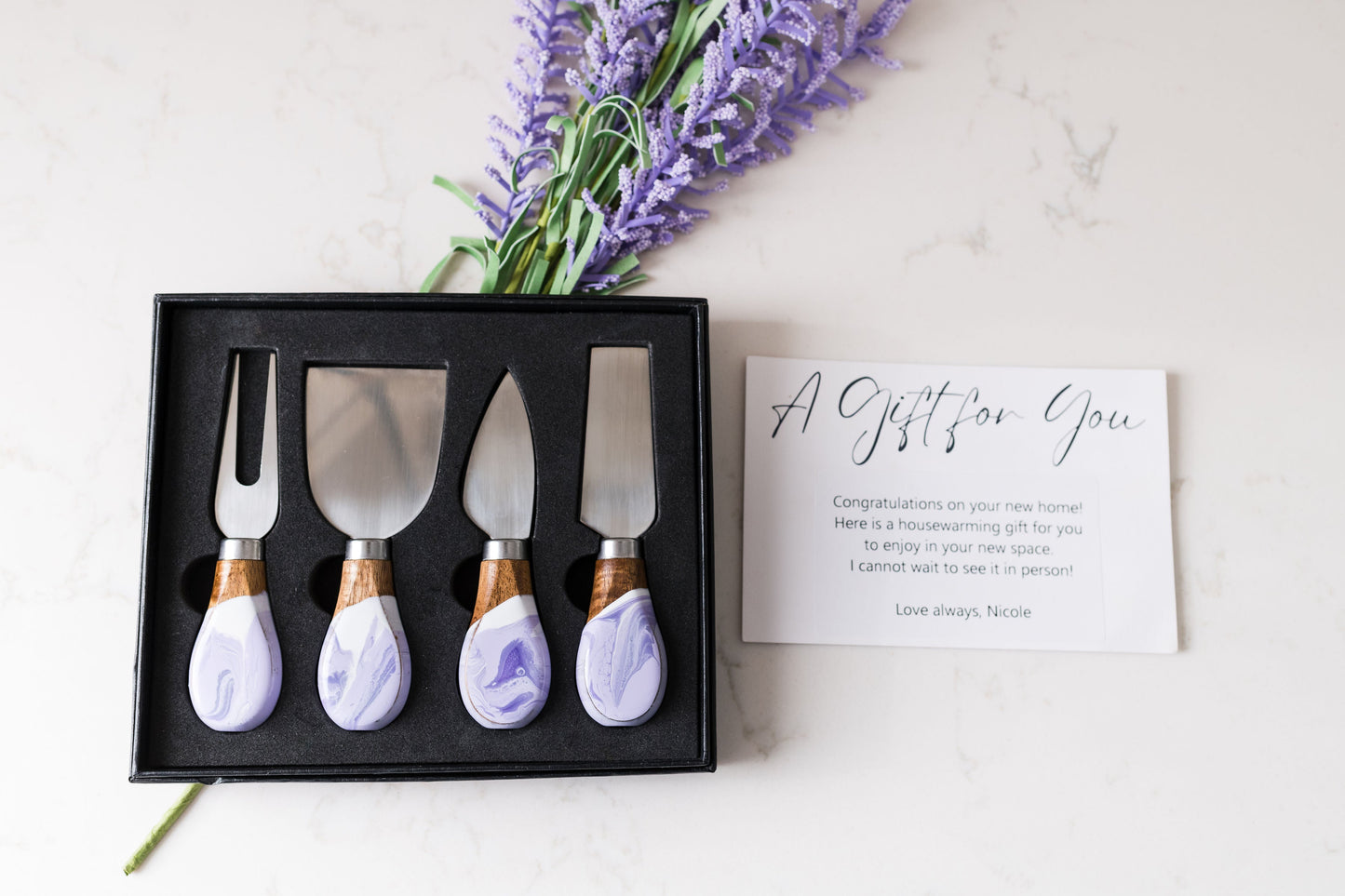 lavender resin cheese knives on a kitchen counter