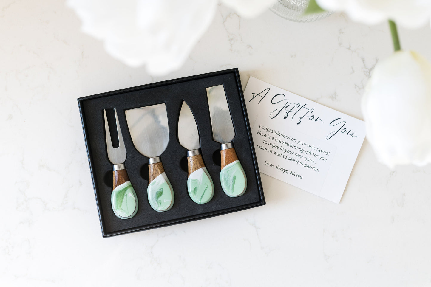 mojito cheese knives on a kitchen counter