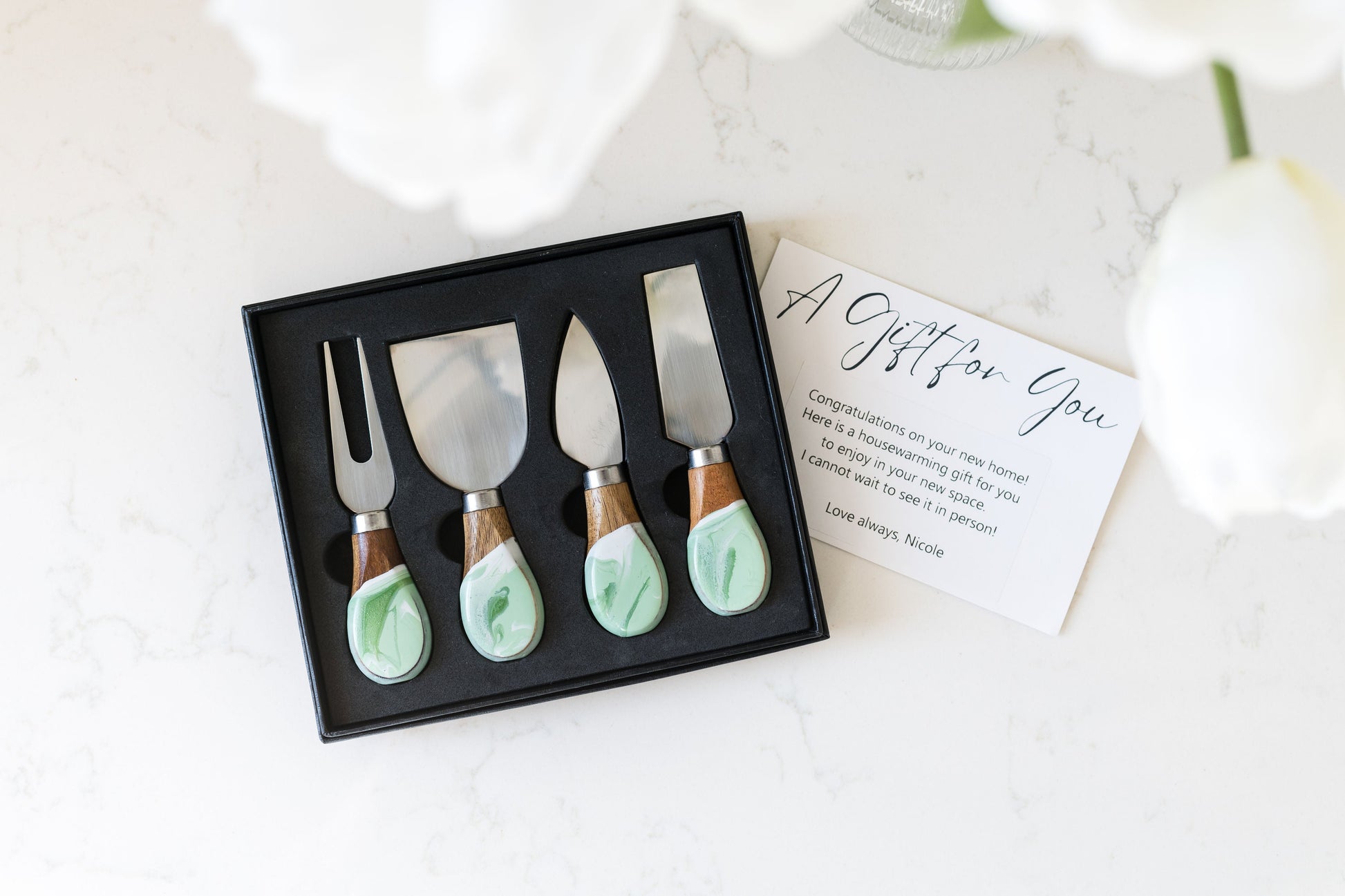 mojito cheese knives on a kitchen counter