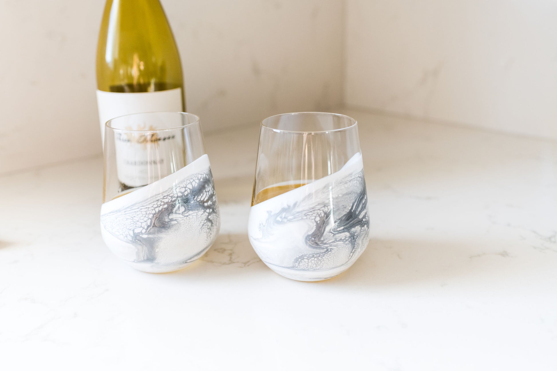 Marble wine glasses on kitchen counter