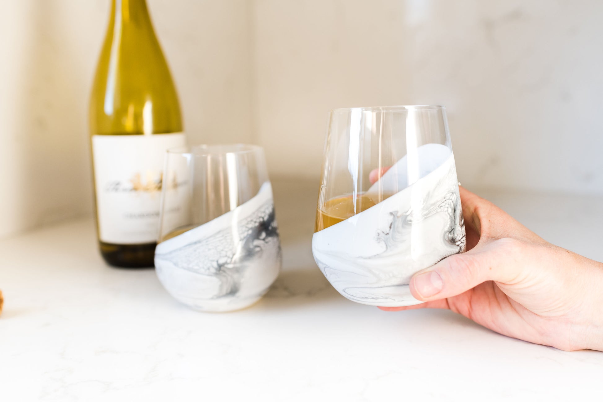 Marble wine glasses on kitchen counter