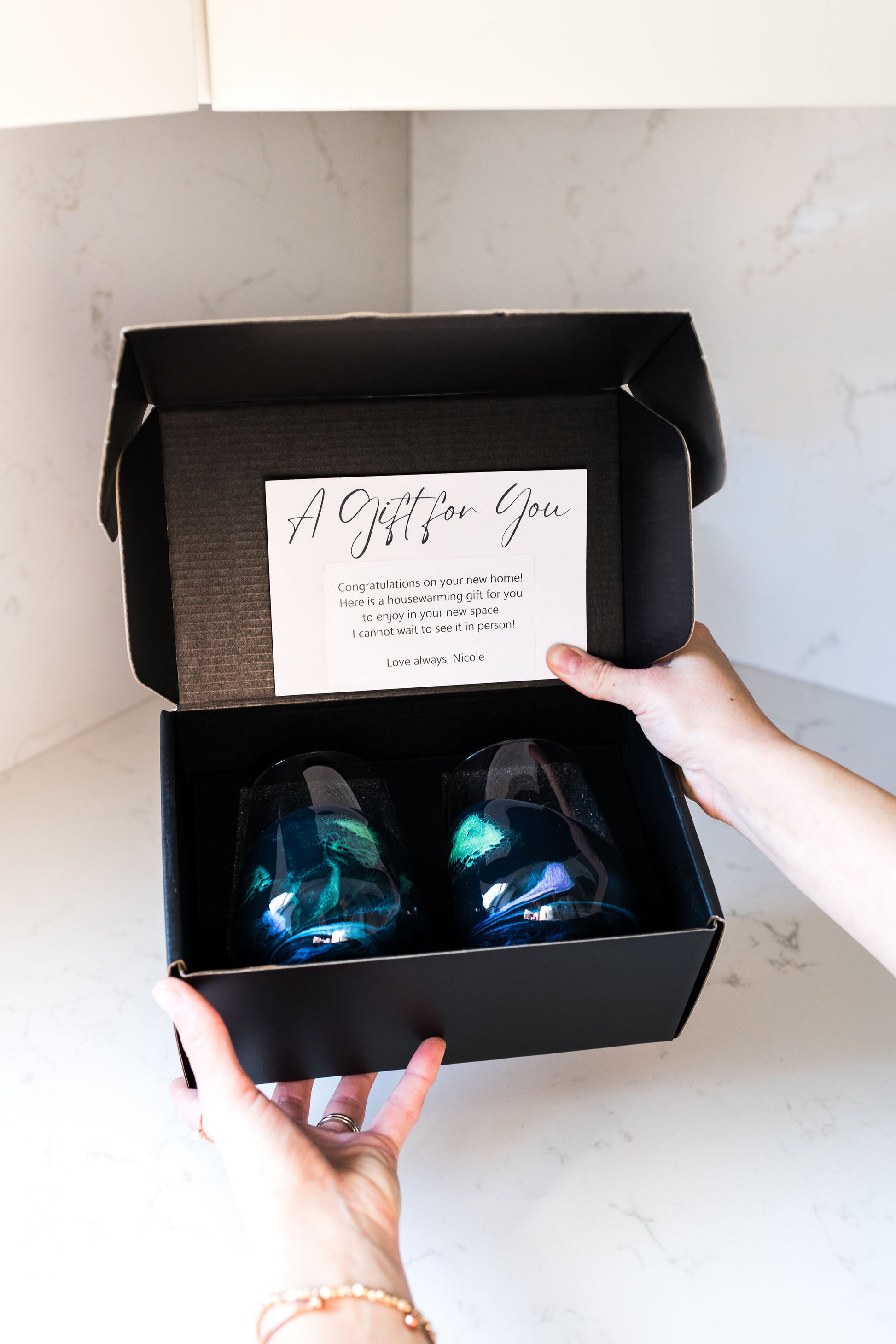 Set of two northern lights wine glasses in black gift box