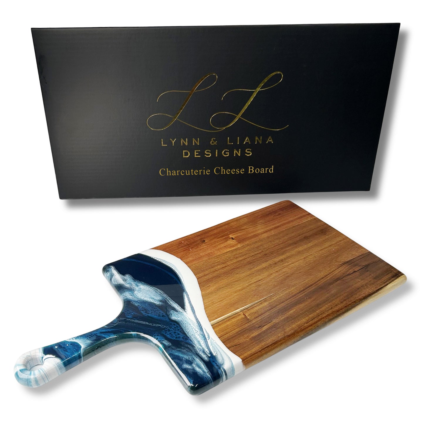 large acacia cheese board accented with resin