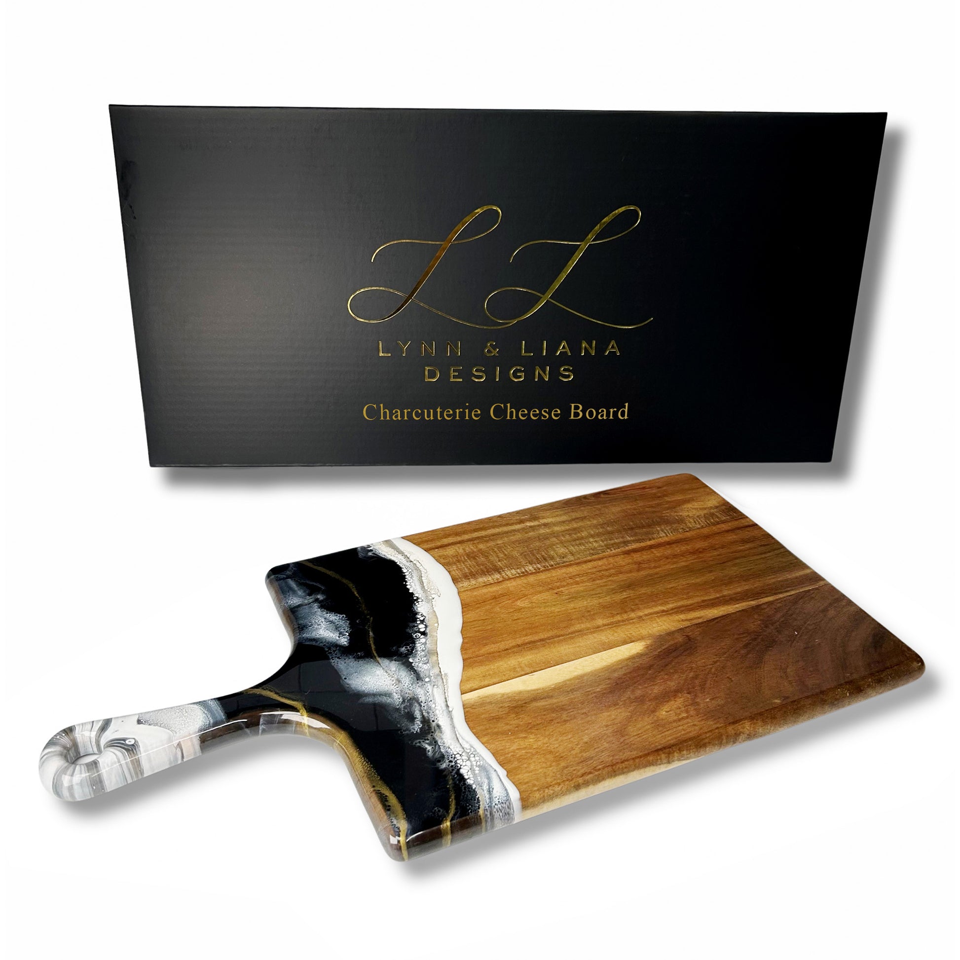 large acacia cheese board accented with resin