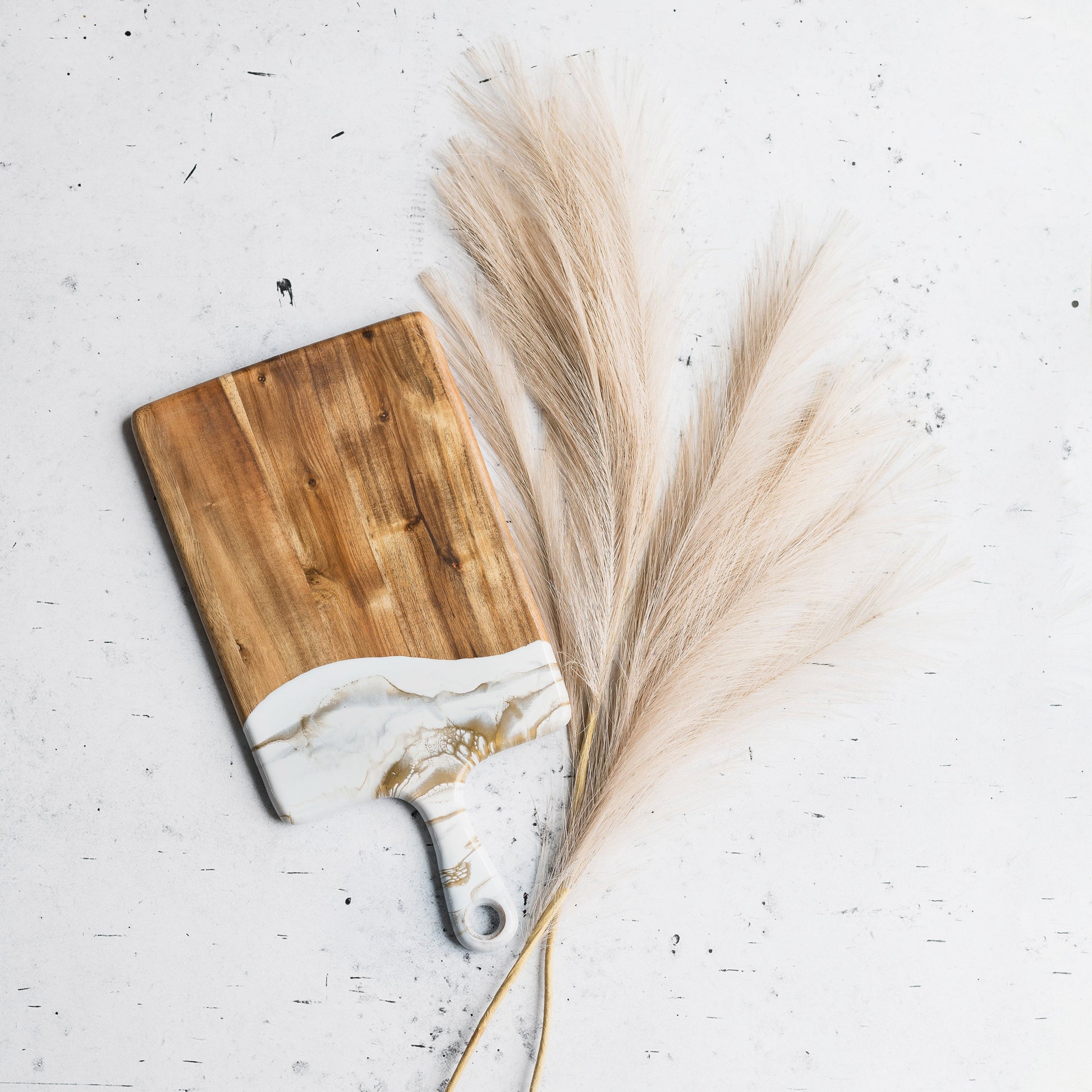 medium acacia cheese board accented with resin