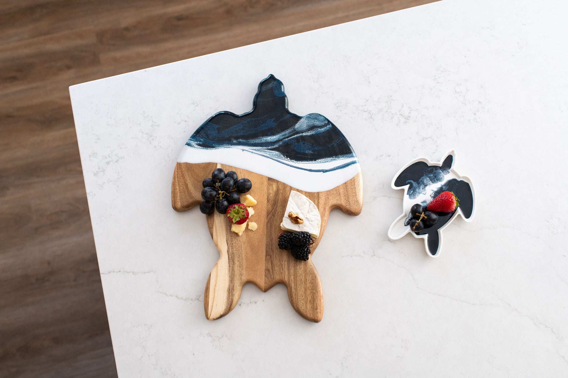 Navy white turtle board side by side with the matching turtle ceramic tray 