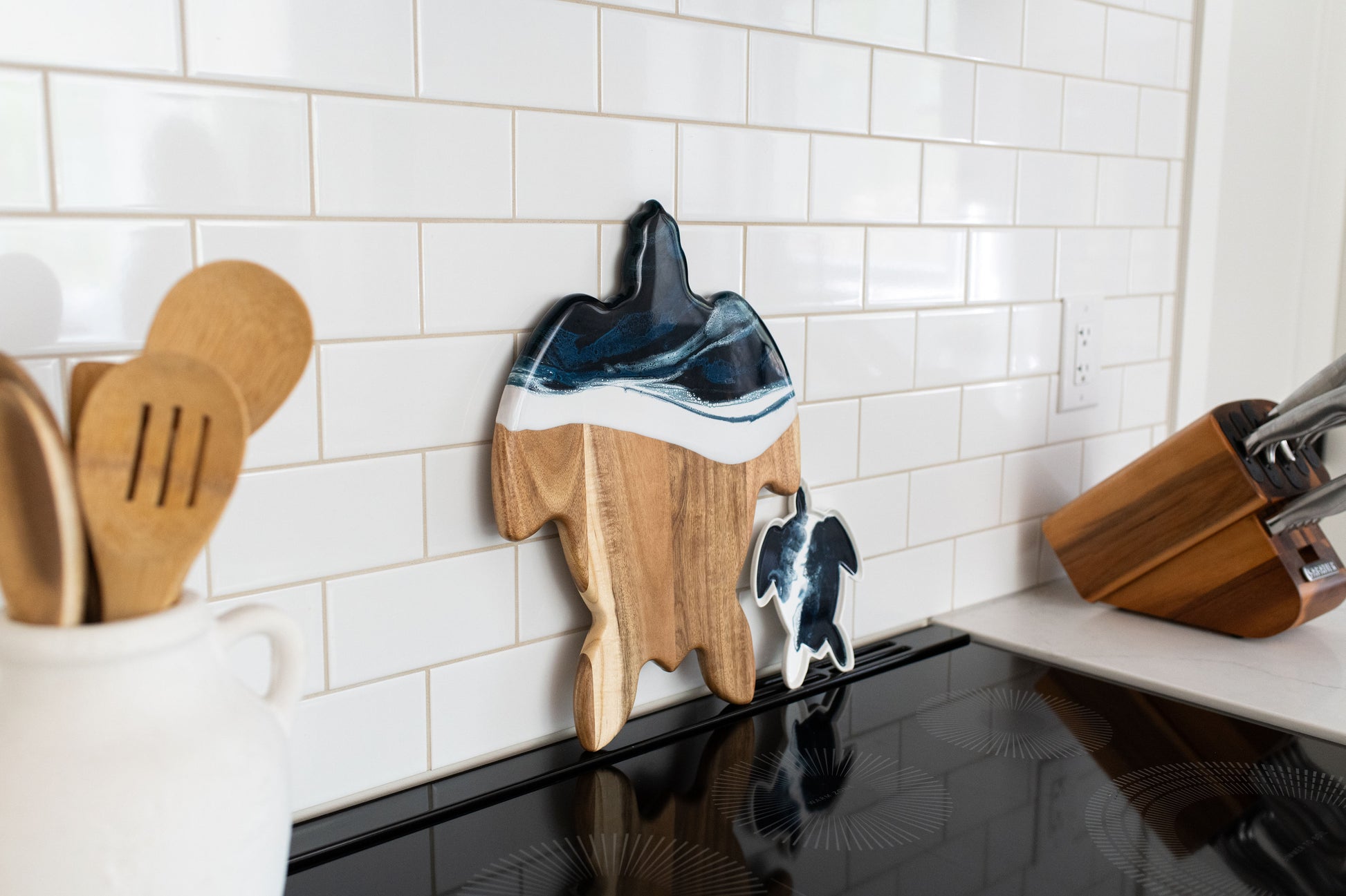 Navy White metallic turtle board and matching ceramic tray in kitchen 