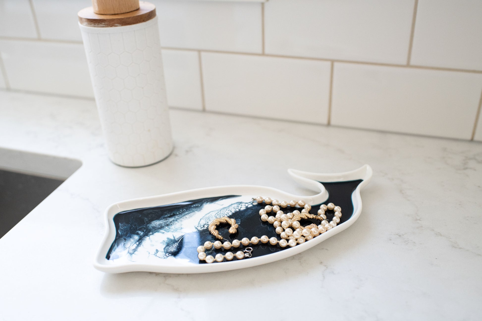 navy white whale ceramic tray on kitchen counter 