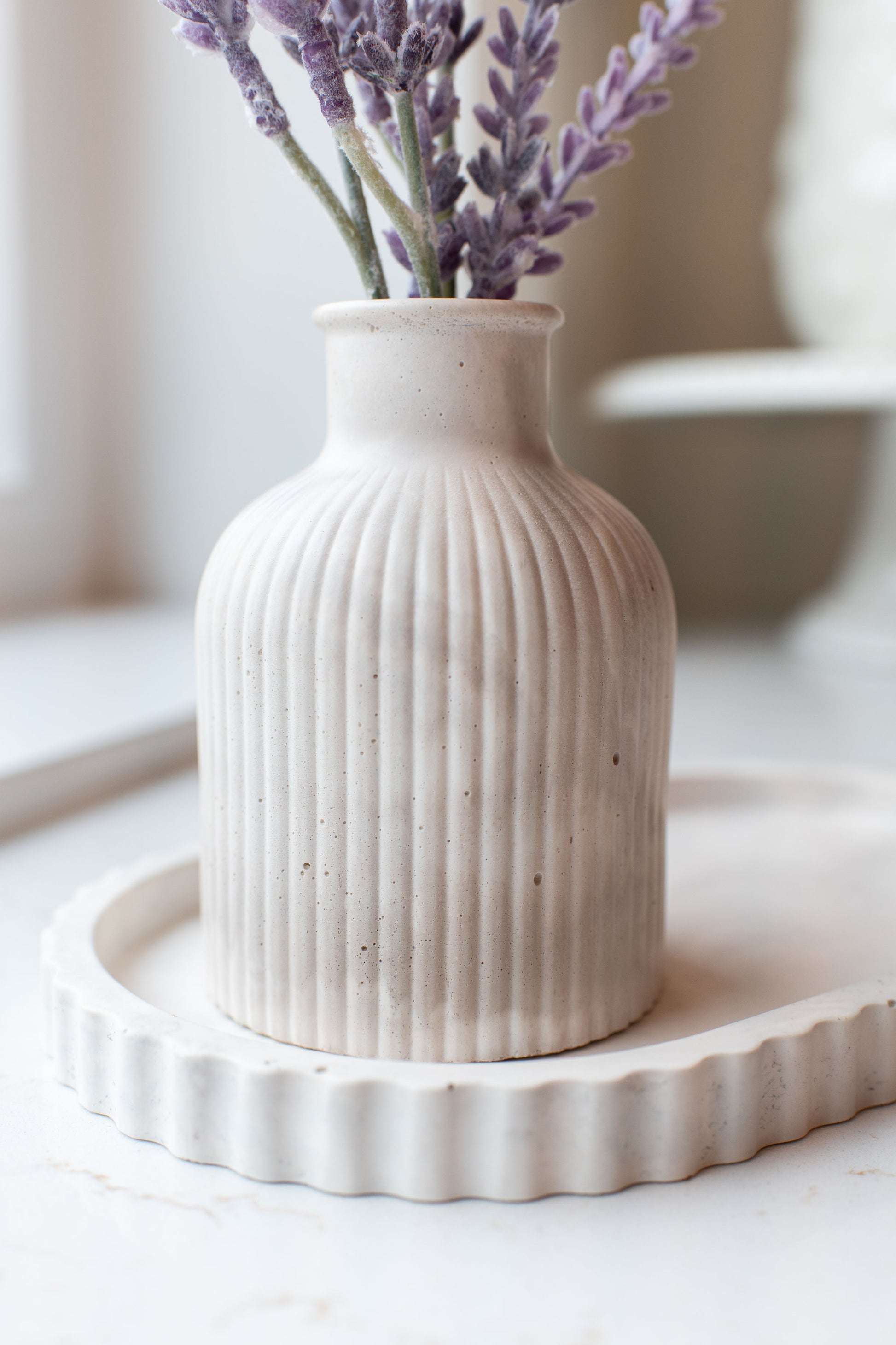 Closeup of the Limestone budvase 