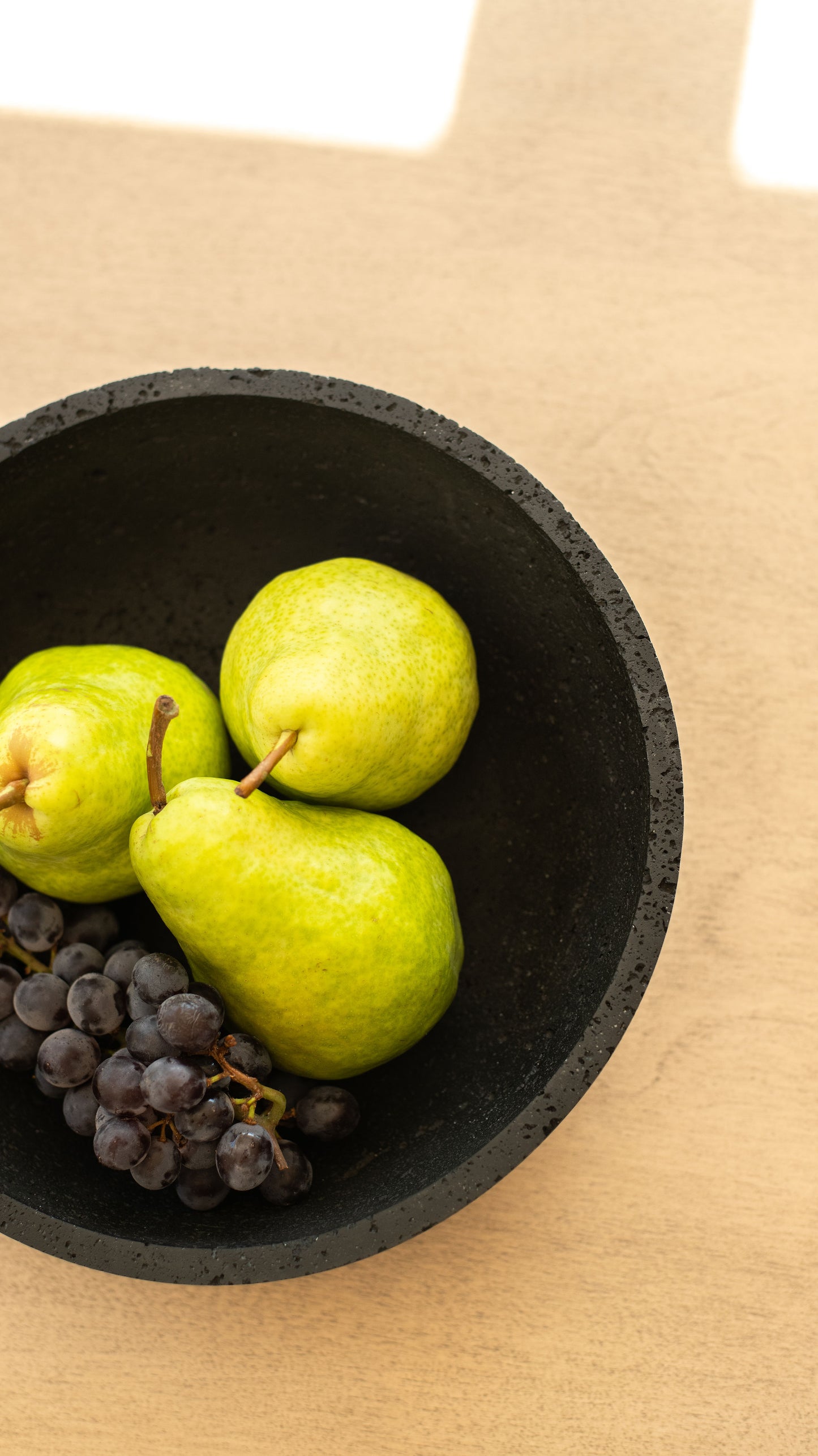 Travertine and Lava Rock Fruit Bowl