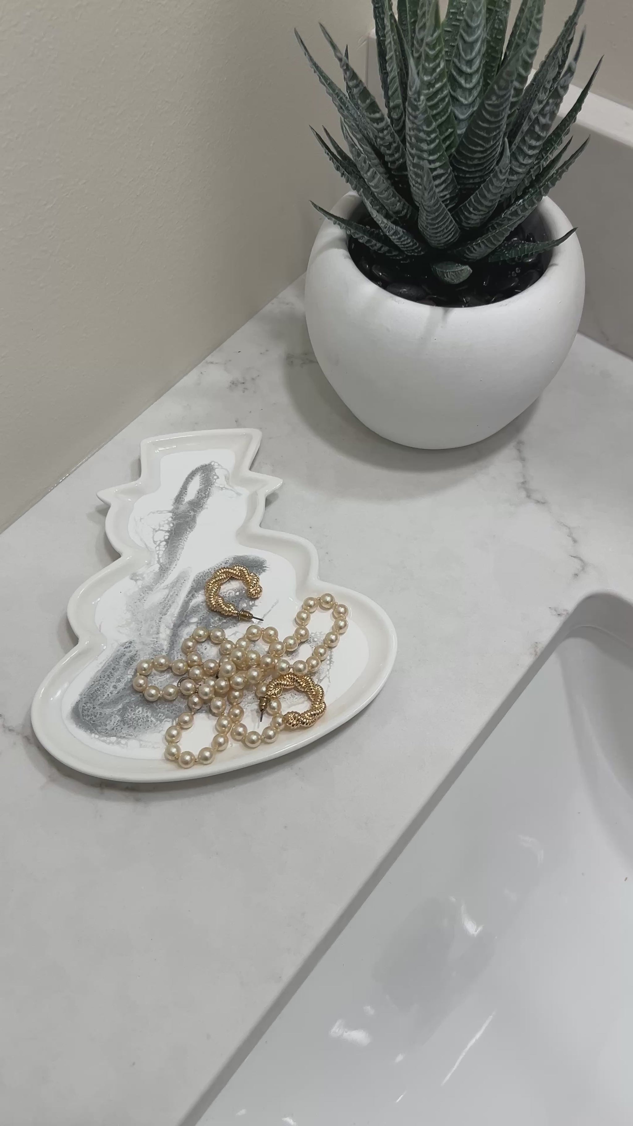 snowman shaped ceramic tray in a silver metallic resin design 