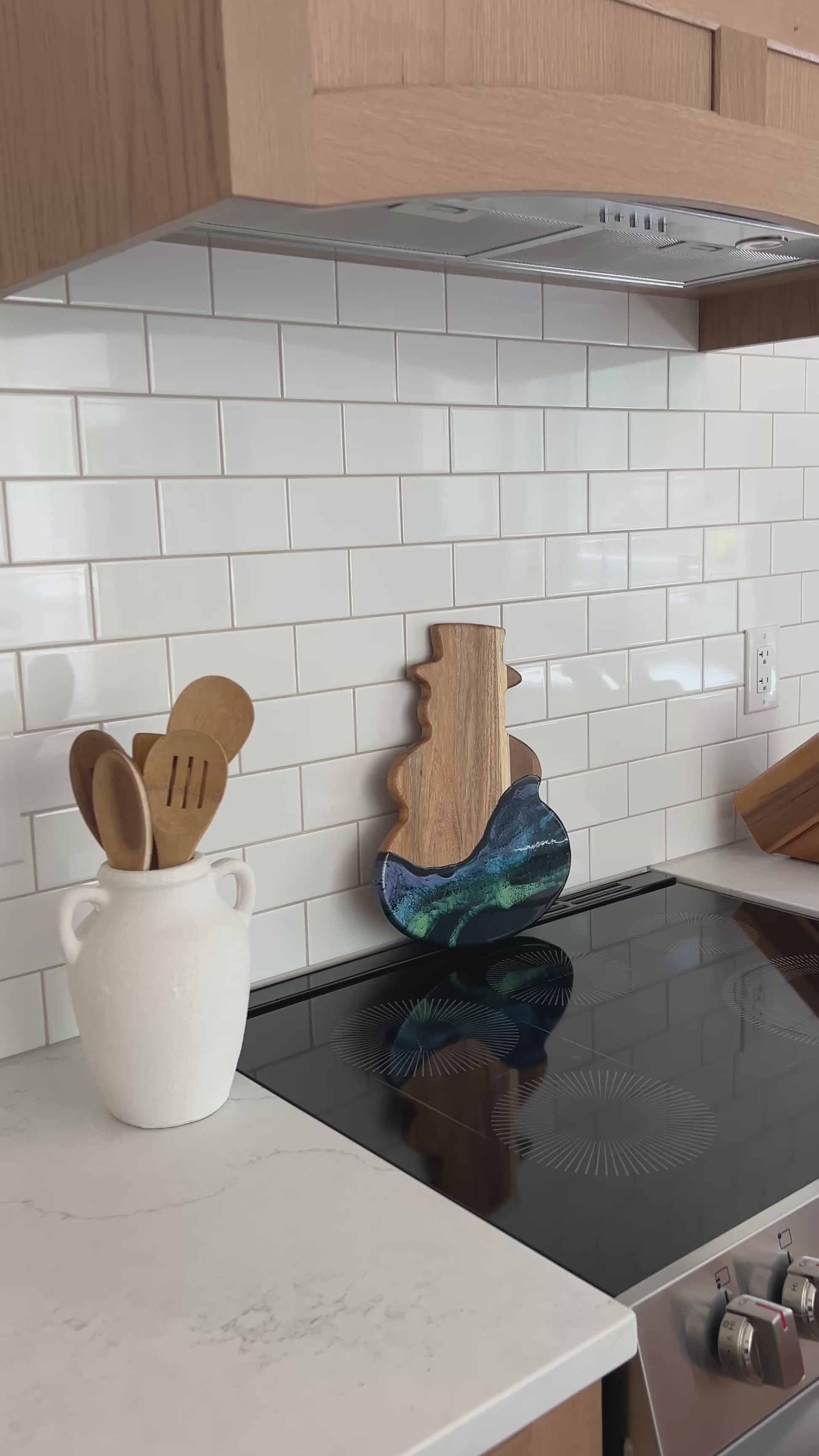 video of the northern lights snowman against a white kitchen back splash 