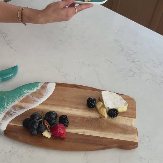 Video of the Caribbean blue whale board and matching ceramic tray on the kitchen counter 