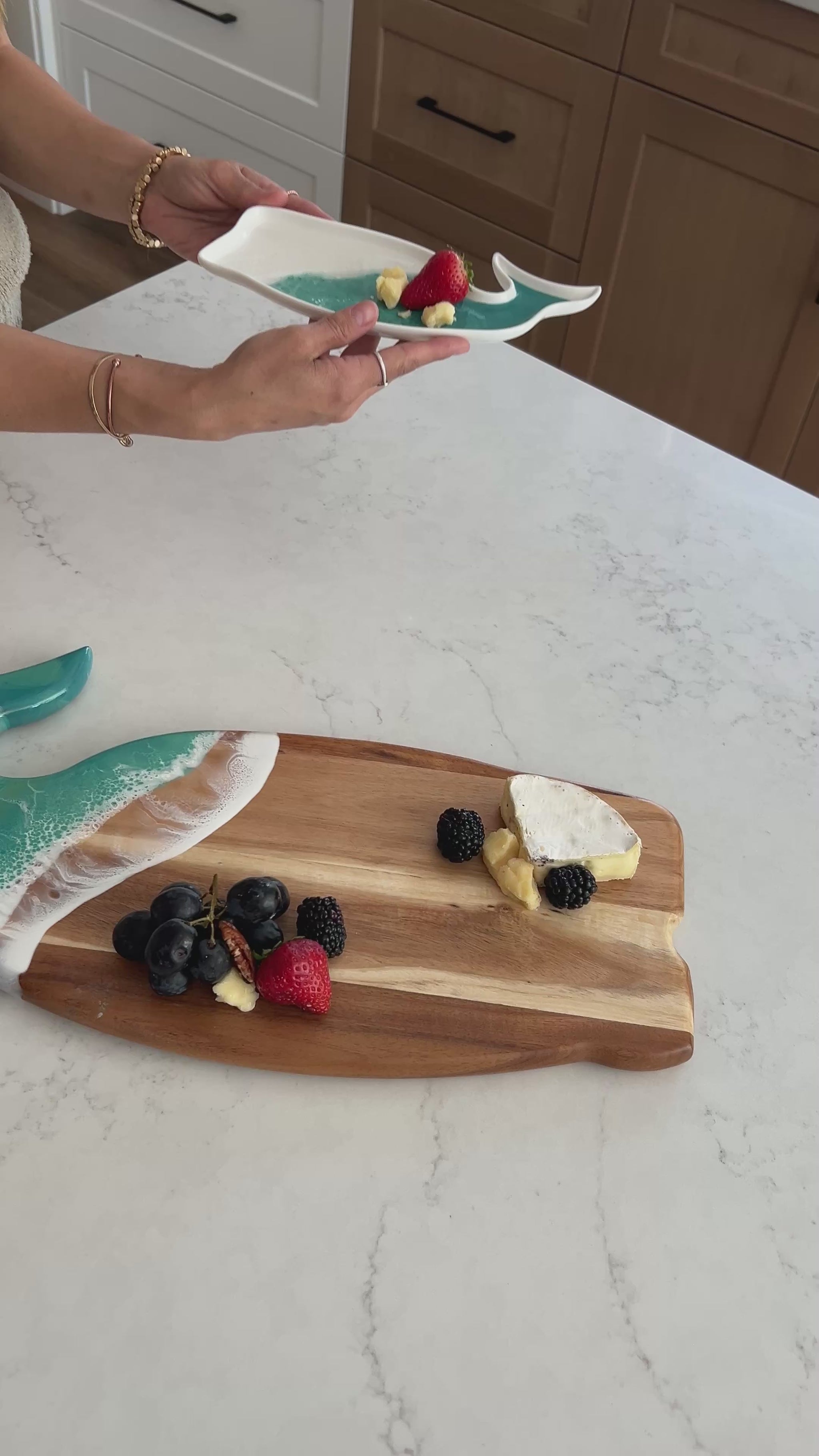 Video of the Caribbean blue whale board and matching ceramic tray on the kitchen counter 