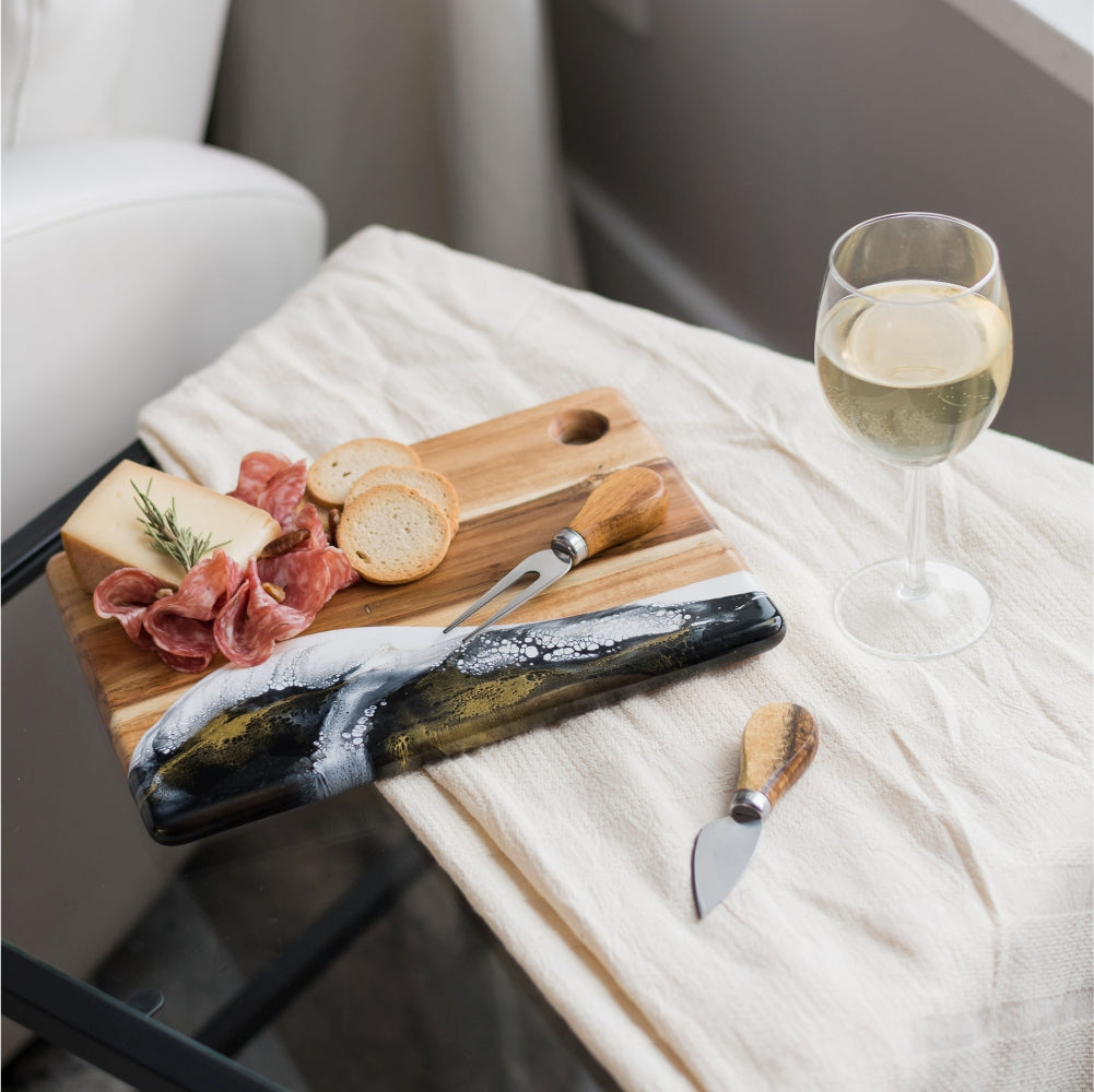 Small cheese boards, hand-made from high-quality Acacia hardwood, eco-friendly resin, a one-of-a-kind piece of serveware for your home. perfect for a single serving or to share with special someone! Onyx