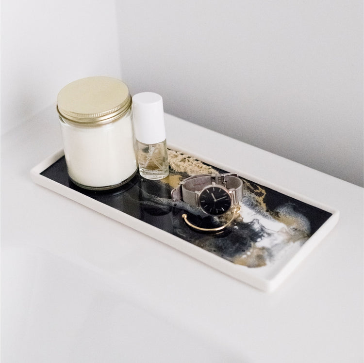 High-quality ceramic and resin trays. They make a perfect accent piece to any bathroom and can also be used as a gorgeous jewelry tray. Lynn & Liana Onyx