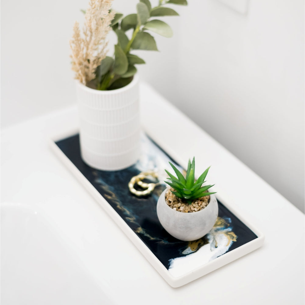 High-quality ceramic and resin trays. They make a perfect accent piece to any bathroom and can also be used as a gorgeous jewelry tray. Lynn & Liana Sapphire Sky